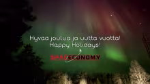 Joulukortti, missä revontulia Sodankylän taivaalla